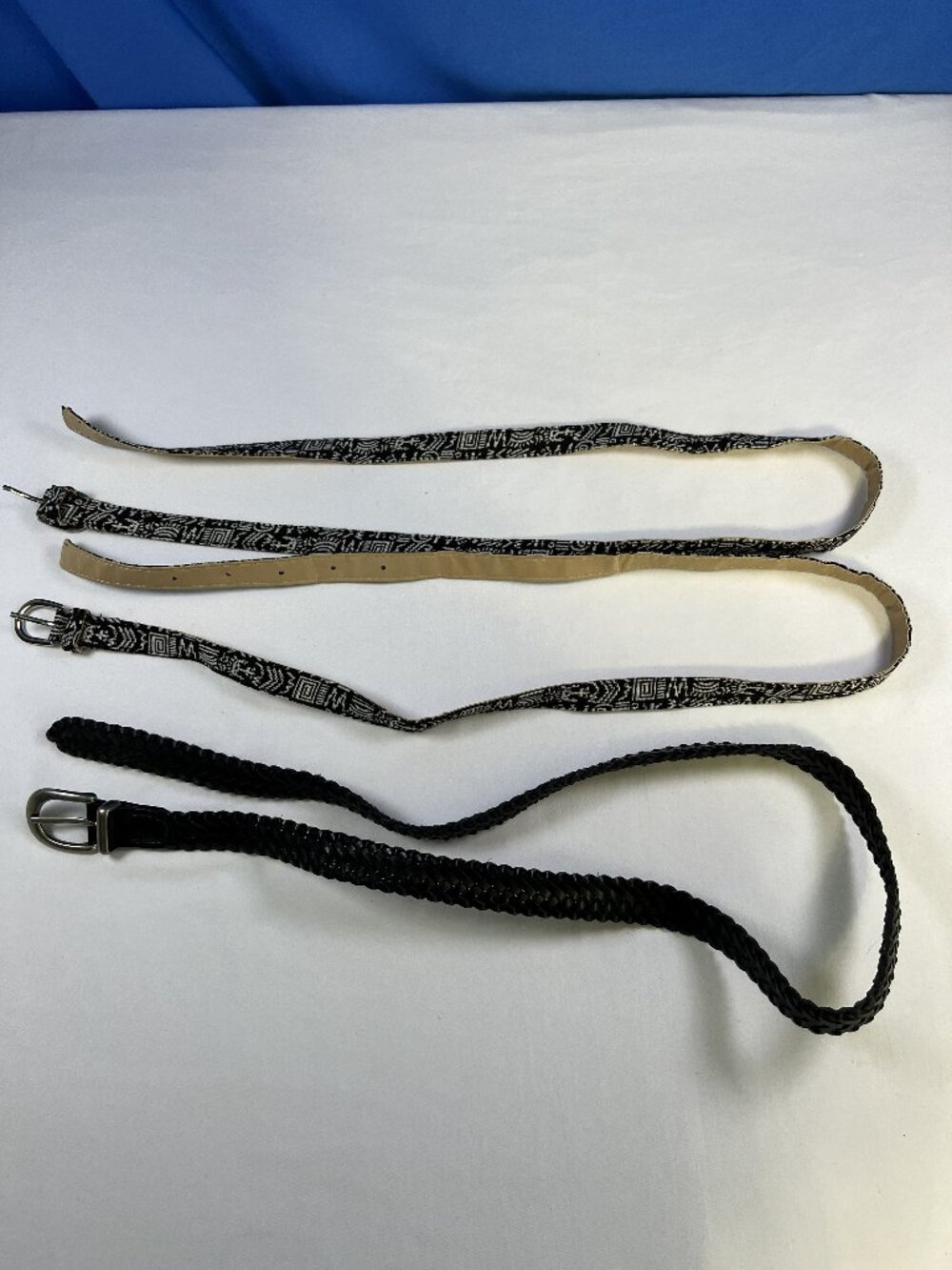 3 pairs of unbranded belts each 42 inches long